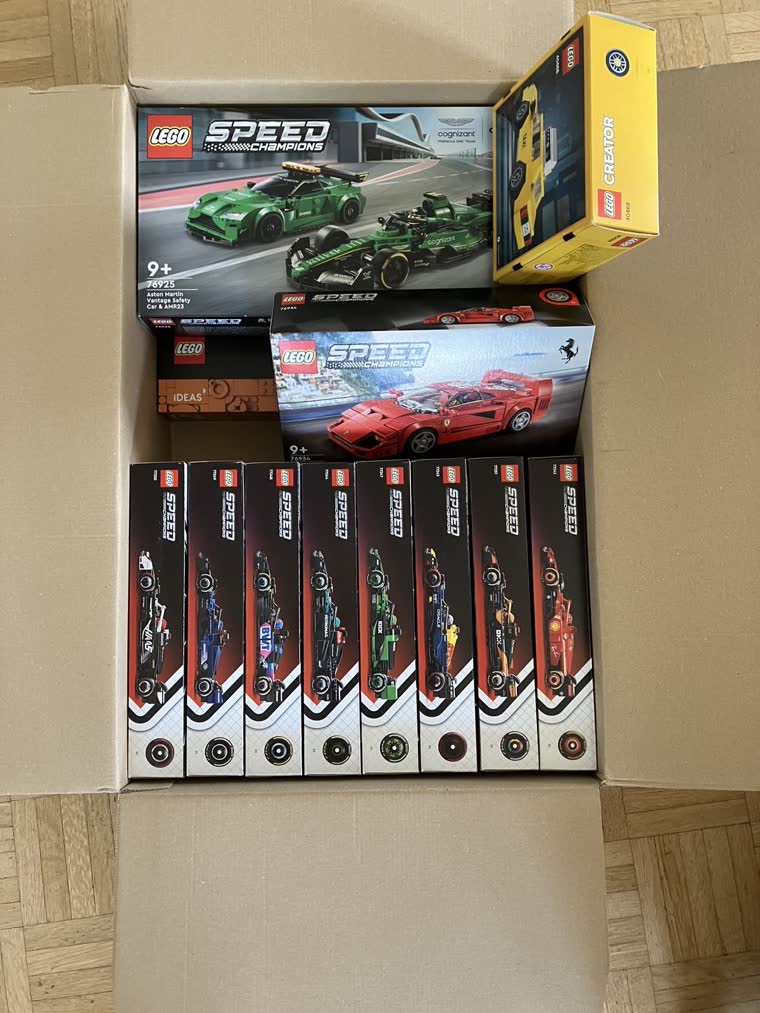 Box full of LEGO Speed Champions and Creator sets